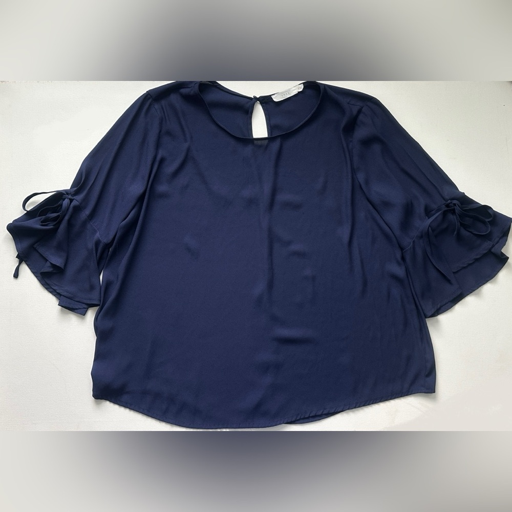 Lush women’s navy blue feature details ruffles, has round neck.  Size S.